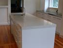 white kitchen with rimu floor